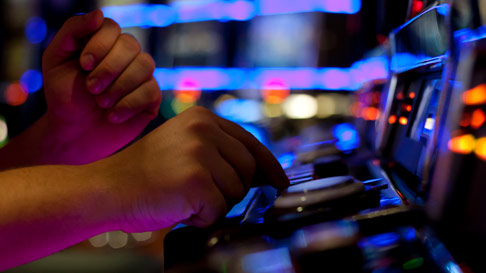 pushing bet button in casino