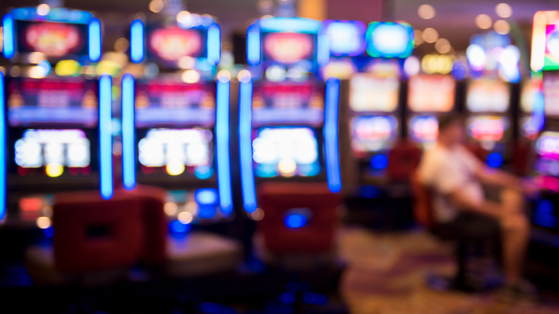 rows of slot machines blurred